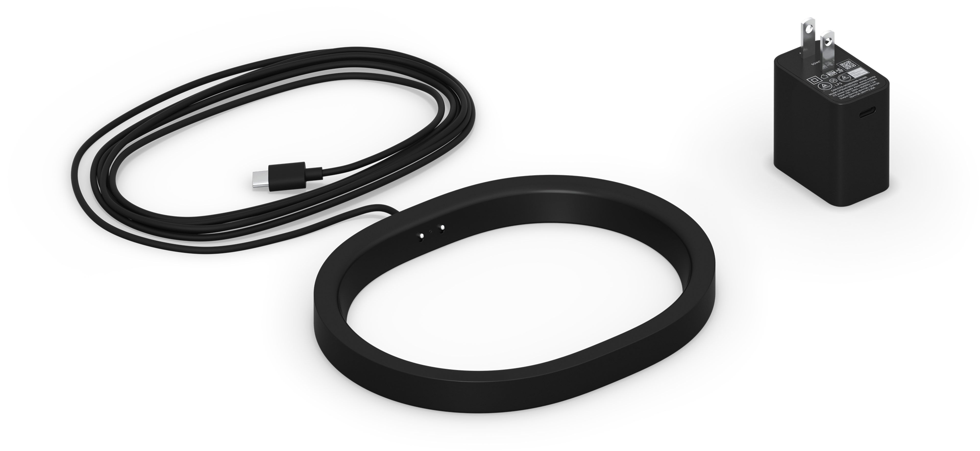 Imagen de la base de carga inalámbrica para Sonos Move 2 en negro con el enchufe correspondiente a la región específica