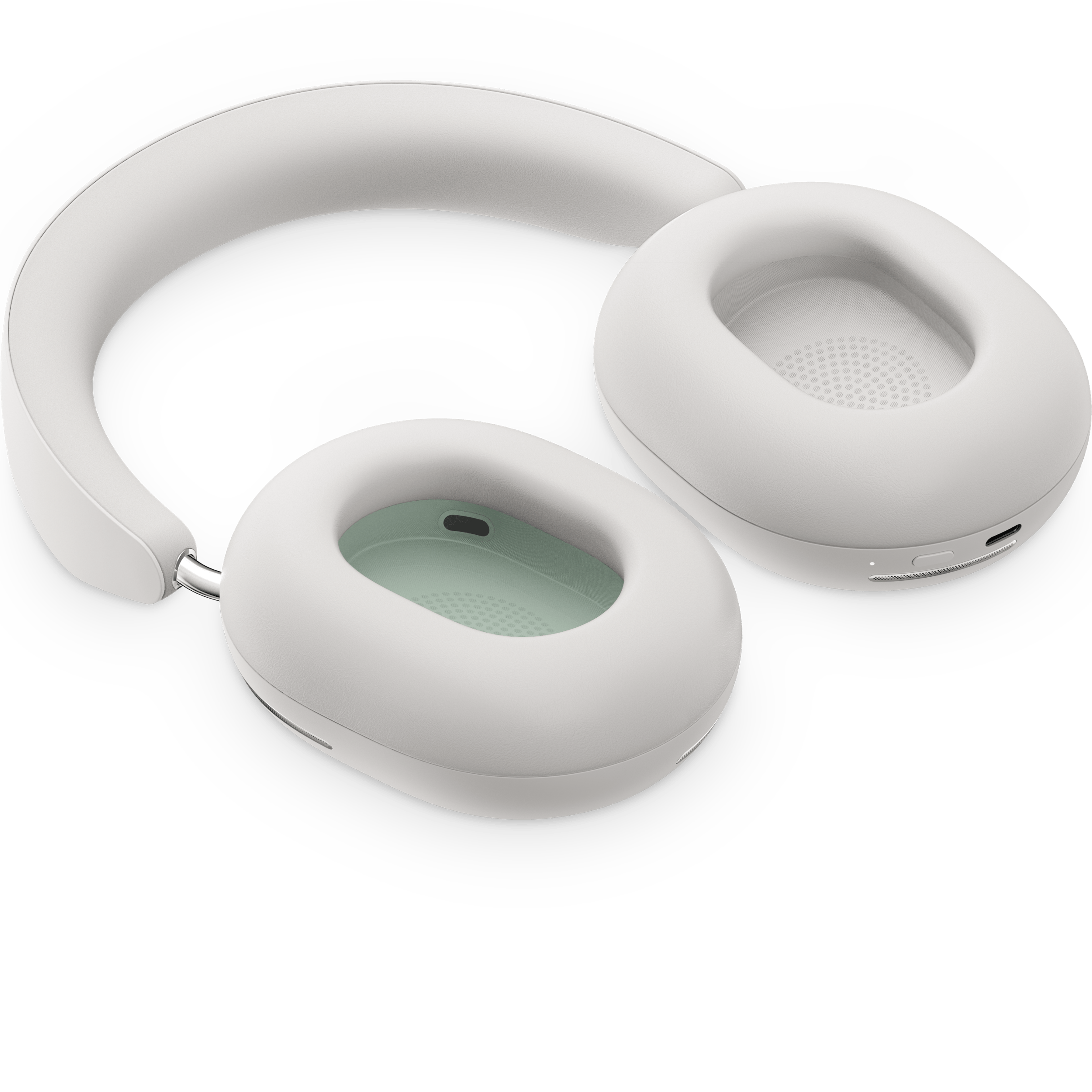 Casque audio Sonos Ace couleur Soft White, posé à plat avec les écouteurs tournés vers le haut