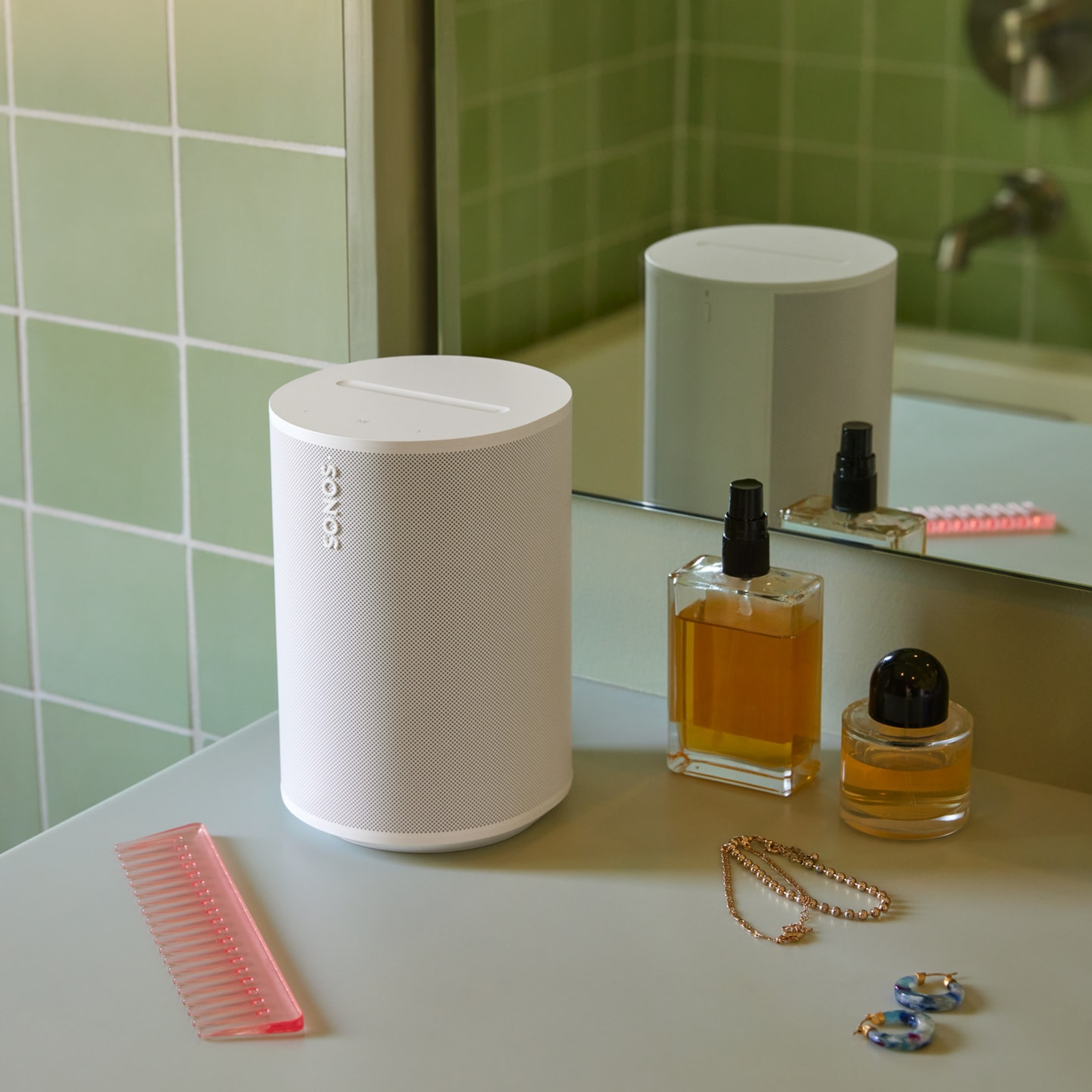 A white Sonos Era 100 SL on a bathroom vanity
