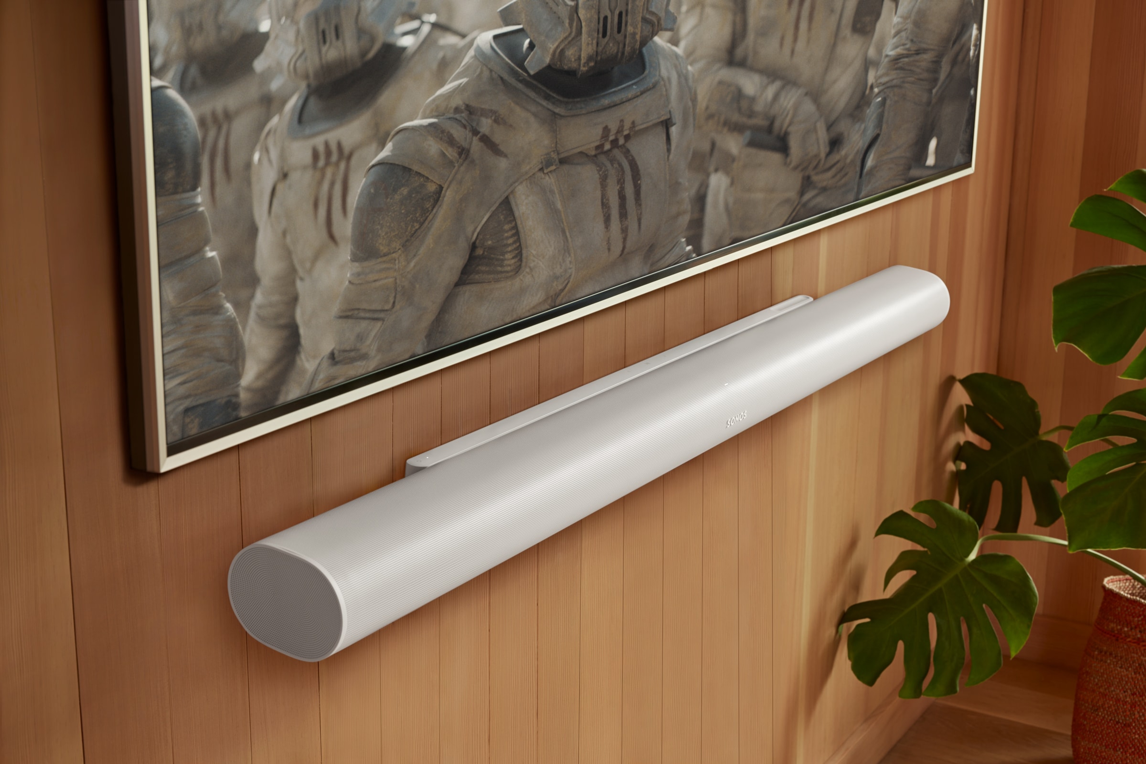 White Arc Ultra mounted on a wall under a TV